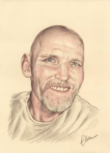 Portrait dessin d'un homme aux yeux bleus souriant